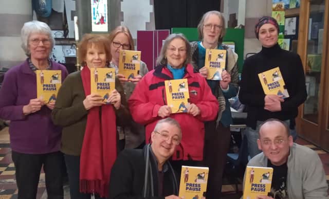 Writers with their new book.