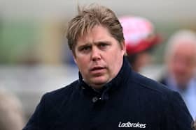 Dan Skelton looks on prior to The Kingston Stud Handicap Hurdle at Cheltenham Racecourse in 2023.