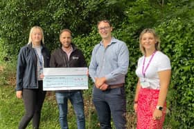 Colleagues from local housing provider Orbit present donation to Warwickshire Wildlife Trust