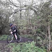 Paddy Doyle negotiates a muddy footpath.