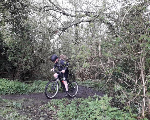 Paddy Doyle negotiates a muddy footpath.