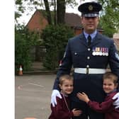 Sergeant Sean Pellington with his sons, Finley (6) and George (5) who both attend Emscote Infant School. Photo supplied