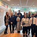 The team at Specsavers in Leamington has helped raise £150 to support those affected by the landslides in Kerala, India. Photo supplied