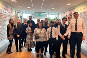 The team at Specsavers in Leamington has helped raise £150 to support those affected by the landslides in Kerala, India. Photo supplied