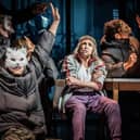 Kathryn Hunter (centre) in Drive Your Plow Over the Bones of the Dead