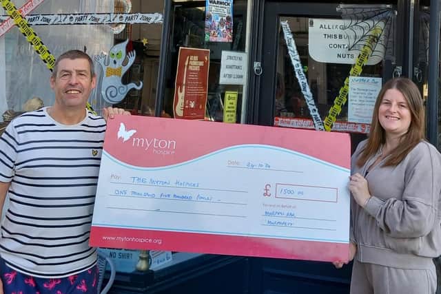 Kevin Murphy and Shannon Byrne of Murphy's Bar with the cheque for £1,500 for the Myton Hospices from the money raised from Murph Fest. Picture supplied