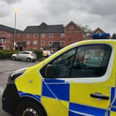 Police at the scene in Baxter Court