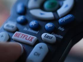 Netflix is launching the sub-account model soon, and a cheaper subscription package next month. Picture: Chris DELMAS/AFP via Getty Images.