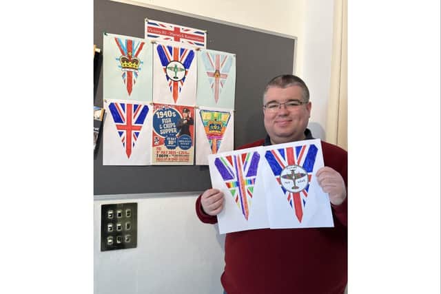 The team at the Visitor Information Centre are appealing to residents for support in their upcoming project to mark the 80th anniversary of VE Day. Photo shows Ashley Garrison-Brown who works at the Visitor Information Centre. Photo supplied.