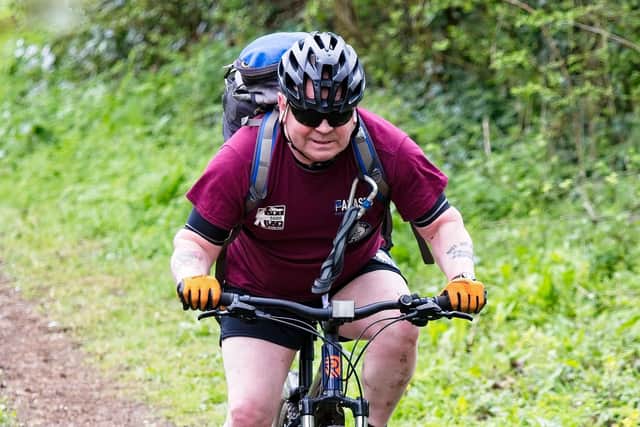Paddy Doyle cycling towards his 715th endurance feat
