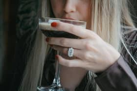 A passenger sips her cocktail aboard the Northern Belle