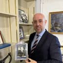 Mark Gilding with the RAF cloth wings featured in the auction