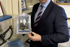 Mark Gilding with the RAF cloth wings featured in the auction