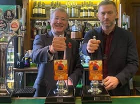 MP Mark Pawsey and Mark O’Neill in the Strangers' Bar pulling pints of Haystack Pale Ale.