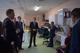 The health minister at Rugby's Hospital of St Cross.