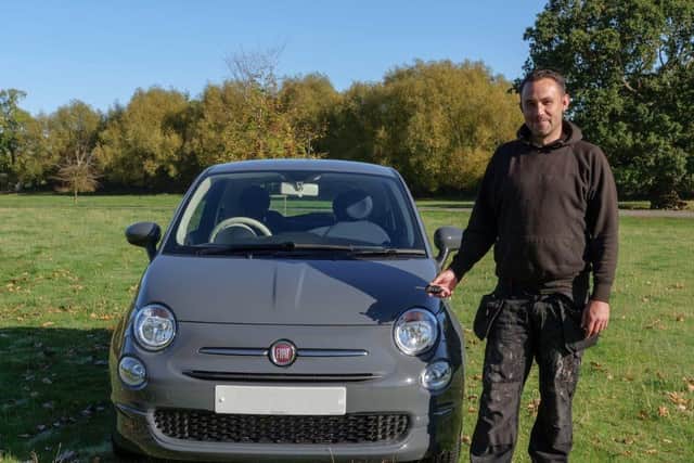 Simon Muirhead, 40, with his new car. Photo supplied