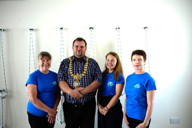 Leamington Mayor Cllr Nick Wilkins with the three directors of Warwickshire Iyengar Yoga (L-R): Di Harris, Sarah Orchard and Lynne Myall.