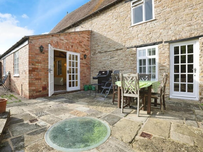 The patio features a six-metre well which has been preserved beneath reinforced glass.