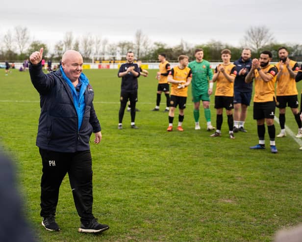 Paul Holleran takes the applause after taking charge of his 700th game at the club.  Pic: Cameron Murray.