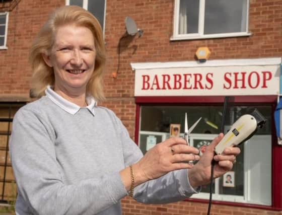 Yvonne Busby is inviting ten of her customers to have most of their hair cut off at her Barbers Shop in Wellesbourne to raise money to raise money for the University Hospital Coventry & Warwickshire’s head and neck clinic, which treated her late husband Bill before he died from throat cancer earlier this year. Photo credit: Avon Studios