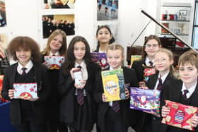 Students with the items at Avon Valley School.