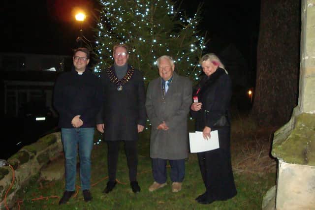 The Rev Ben Cook vicar of St Margaret’s church in Whitnash, Mayor of Whitnash Cllr Simon Button, President of Leamington Spa Rotary Barry Andrews and Elaine Horsley, a fundraiser from the Myton Hospices, launch the Whitnash Tree of Light on Saturday (November 18).