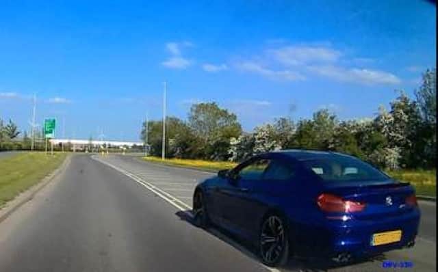 This dashcam footage showed a driver overtaking a cyclist and motorcyclist contravening solid white lines at speed.