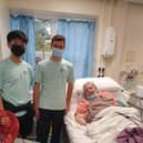 Students from Rugby School congratulated a patient in the Ash Dialysis Unit who won a bingo session.