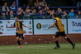 Cally Stewart (left) celebrates his goal against Buxton. Photo: Chris Stewart/LFC.