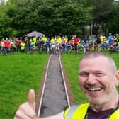 Simon Storey with the group of Kidical Mass riders behind him.