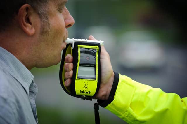 A driver who got out of his car to chat to police officers, who were dealing with a collision in Radford Semele, was himself charged after he failed to provide a breath test.