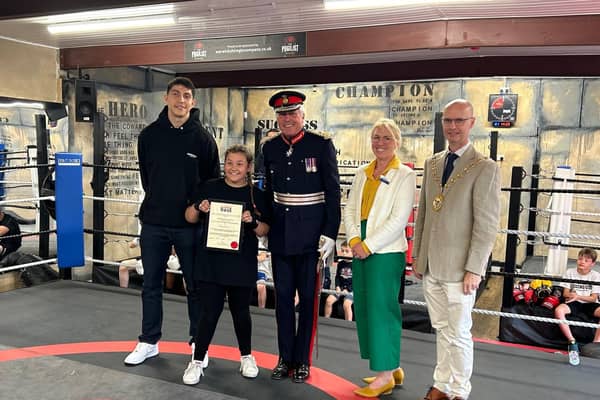 Rosie Dacre receives her award from Lord Lt Tim Cox,  Warwickshire Deputy Police & Crime Commissioner Emma Daniell, WDC leader Cllr Rob Margrave & Lewis Williams.