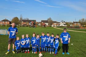 Simon pictured with the team.