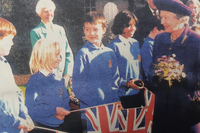 Pupils at Newburgh School greet the Queen