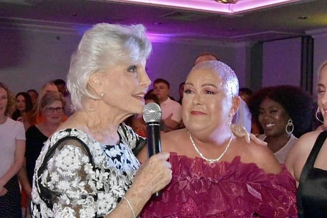 Angela susprises Tracie at her Strictly Pink event. Picture: Steve Porter Photography.