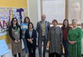Cllr Maggie O'Rourke, Rugby Borough Council portfolio holder for partnerships and wellbeing, and (centre) the Mayor of Rugby, Cllr Simon Ward, joined members of the Houlton WI at the International Women's Day display at Rugby Art Gallery and Museum.