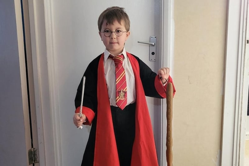 Logan, aged 5, Woodloes Primary School as Harry Potter. His nan spent hours making his robe from scratch!