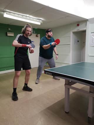 Mark Bastick playing doubles with Ben James.