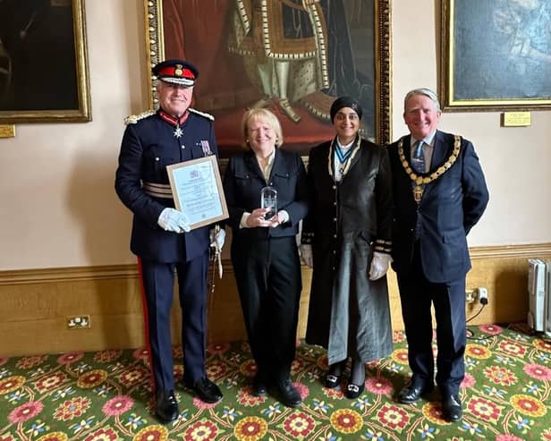 From left to right: Tim Cox, Lord Lieutenant of Warwickshire; Sue Hart of The Graham Fulford Trust; Rajvinder Kaur Gill, High Sheriff of Warwickshire; and Councillor Christopher Kettle, Chair of Warwickshire County Council. Photo by Warwickshire County Council