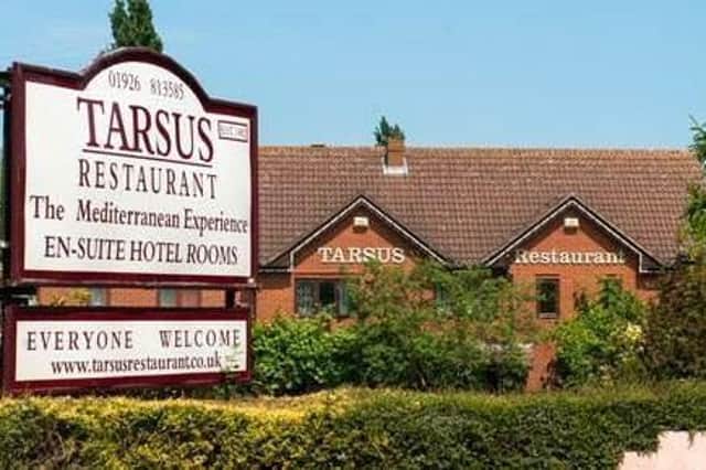 Plans for four houses on the site of the former Tarsus Hotel and Restaurant have been approved in spite of opposition from neighbours and local councillors.