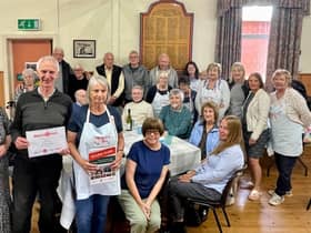 Anne White, WRCC (Warwickshire Rural Community Council) with John Hardman, Hilary Fisher and Barbara Jones from Wolvey Village Hall, with Wolvey volunteers and residents at their Warm Hub