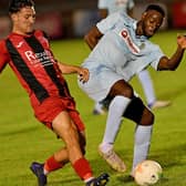 Madundo Semahimbo in action as he scored Rugby Town's second goal in their 7-0 demolition of Rothwell Corinthians. Picture by Martin Pulley