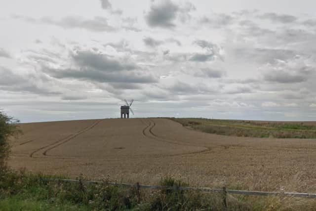 The iconic Chesterton Windmill with its sails. Photo by Google Streetview