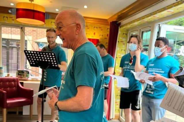 Oz Clarke and the Armonico Consort choir sing at Anya Court Care Home in Rugby.