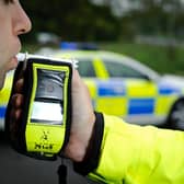 A suspected drink driver who allegedly crashed into three houses has been arrested after a vigilant member of the public followed him to a nearby pub.