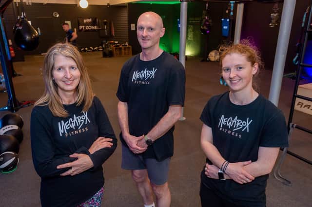 Helen, Tim and Megan Exeter at their gym Megabox Fitness in Leamington. Credit: Mike Baker.
