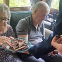 John and Maureen residents at Overslade House enjoying Cadbury's Chocolate