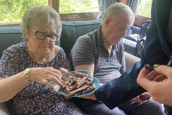 John and Maureen residents at Overslade House enjoying Cadbury's Chocolate