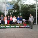 The Mayor of Leamington, Cllr Alan Boad, unveiled the Leamington in Bloom’s floral trains outside the Glasshouse in Jephson Gardens to mark the start of the official judging for the regional 'In Bloom' competition.