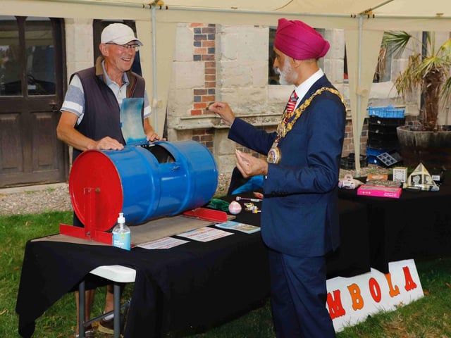 The Mayor of Warwick at the tombola. Photo supplied